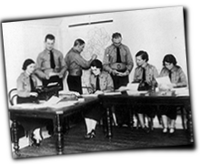 GFX_report_event_IRE_blueshirt_desk